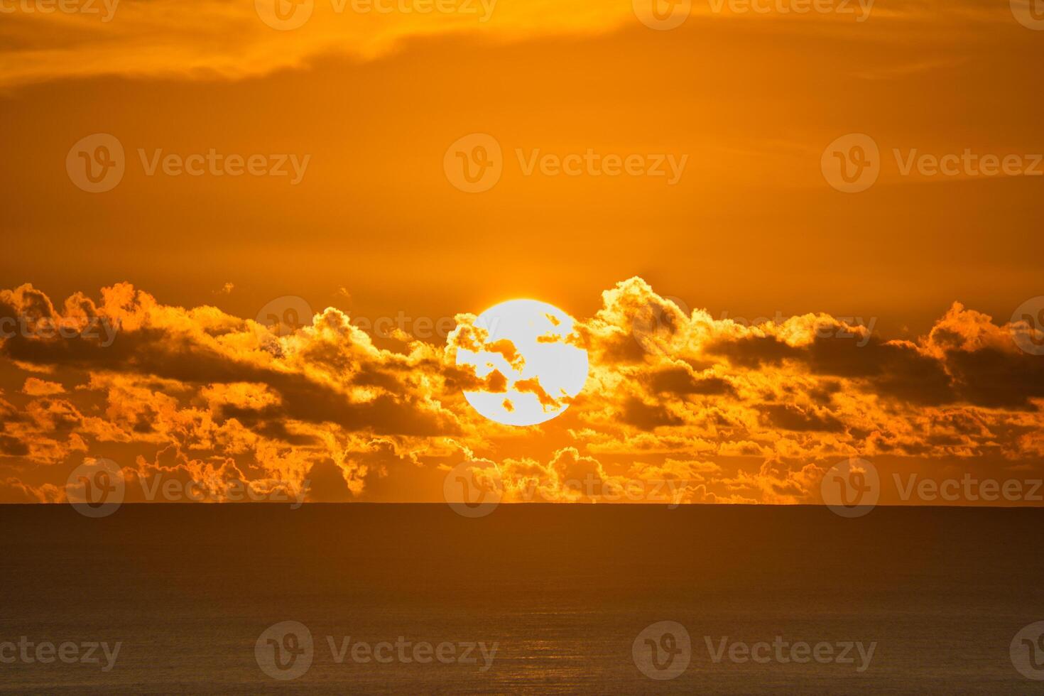 Golden sunset over the ocean, Mahe Seychelles photo