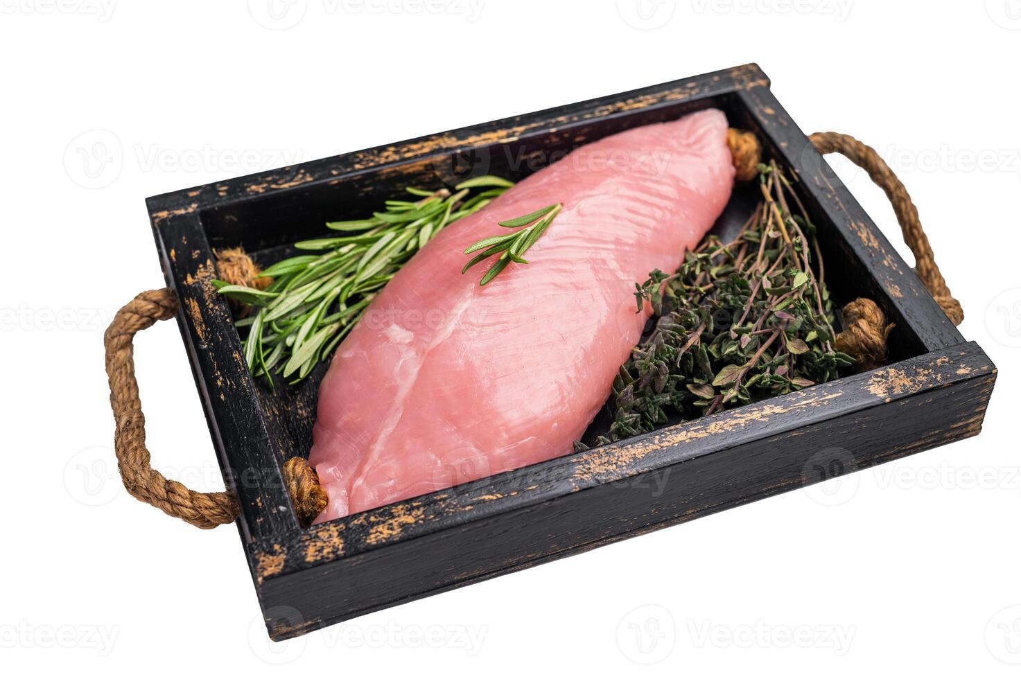 Raw poultry meat, fresh turkey breast fillet with herbs for cooking isolated on white background. top view photo