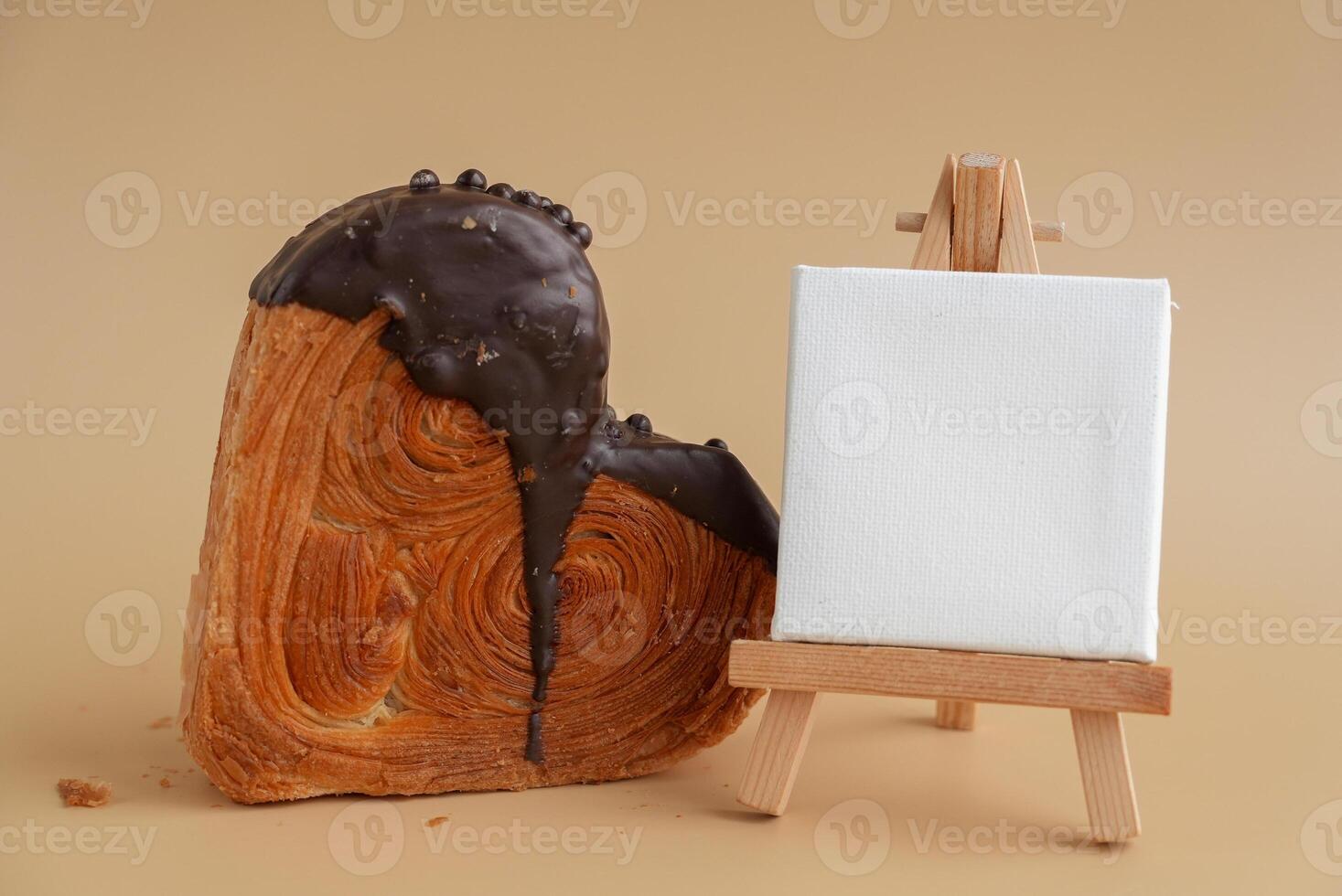 Empty paper note template greeting card mock up Delicious fresh croissant topped with Dark chocolate flavor Ganache. Creation unique heart shape bakery. Puff pastry holiday love gift present idea Valentine's day. Copy space photo