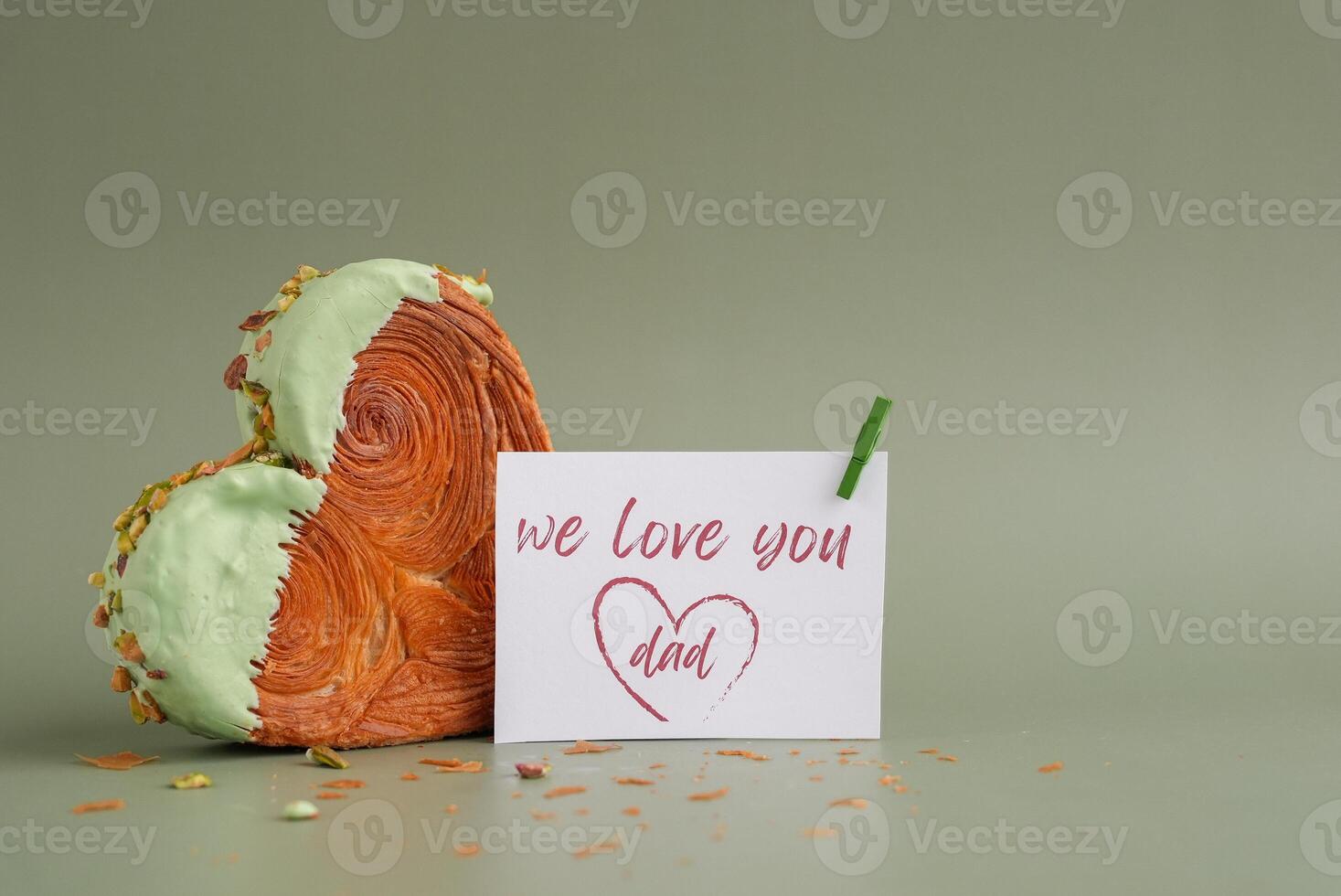 FATHER'S day holiday card Delightful and vibrant heartshaped pastry croissant treat, beautifully topped with colorful frosting nut galore. Mock up template copy space. Food experimentation viral dessert creative baking trend photo