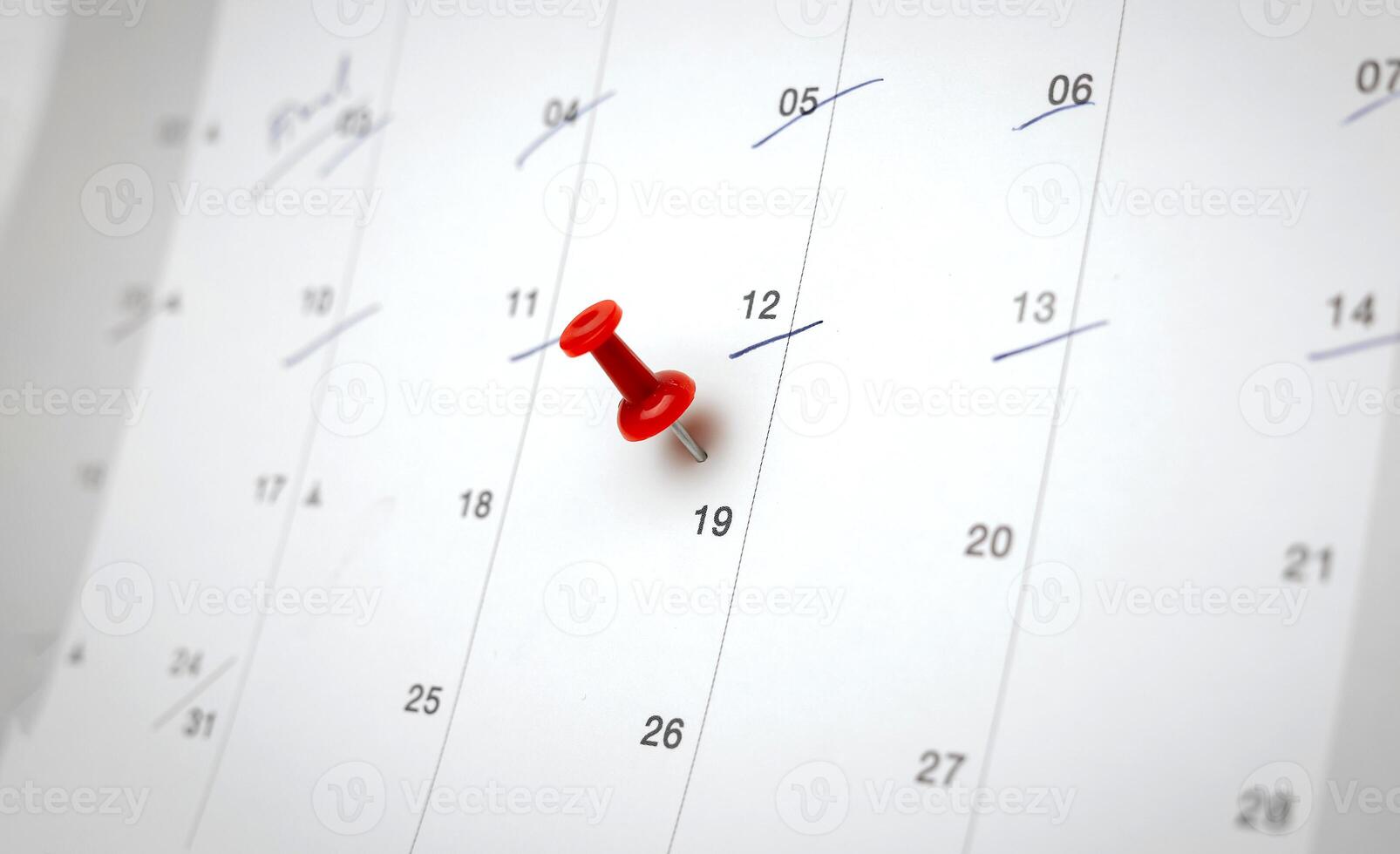 Red pin on calendar. concept of appointment important date notification an appointment with your doctor or schedule a meeting, with copy space for business design photo