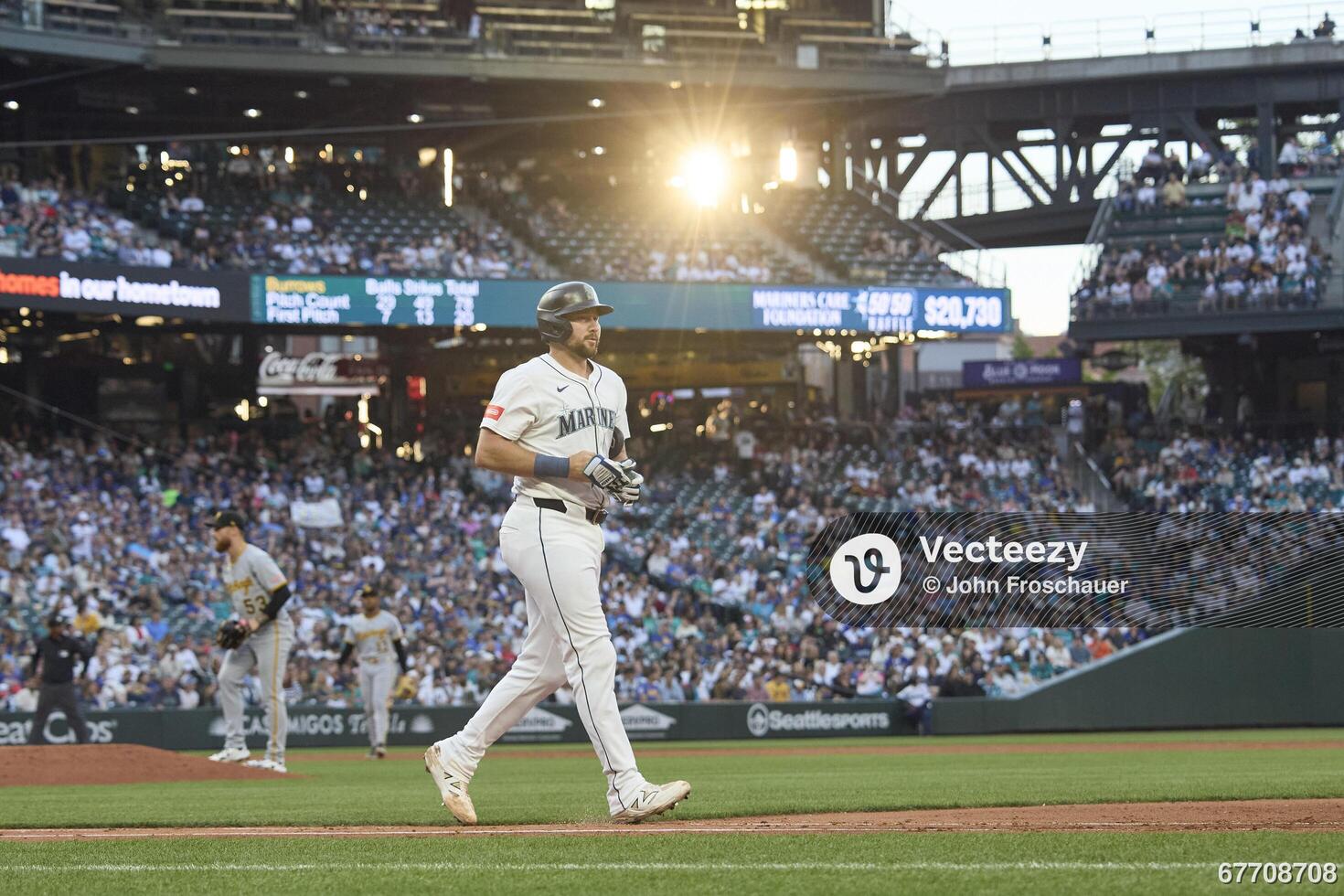 Seattle Mariners catcher Cal Raleigh (29) heads to first on a walk against the Pittsburgh Pirates during the fifth inning at T-Mobile Park. - Editorial Image