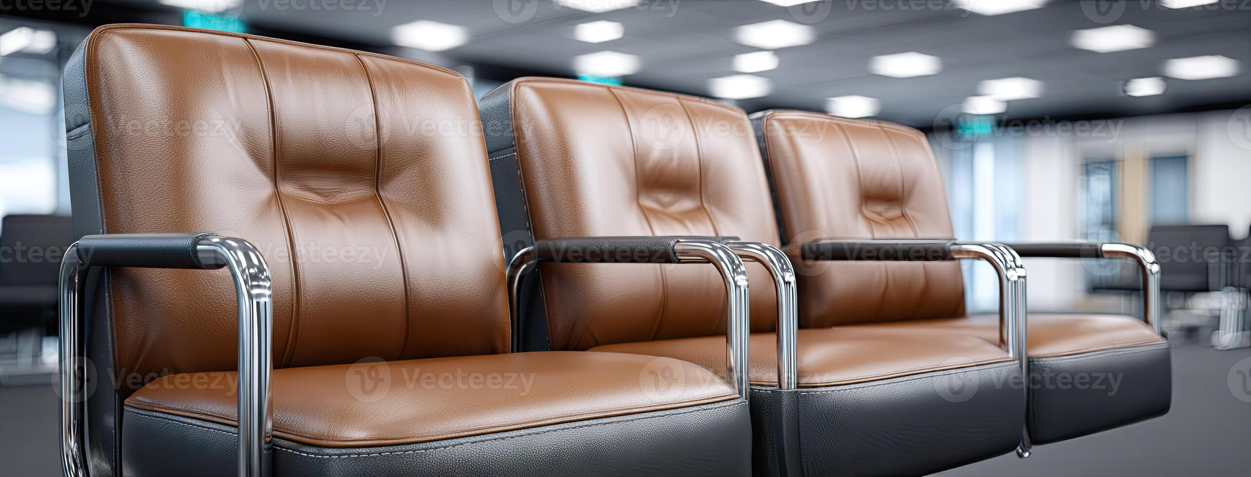 Three leather chairs in an empty room photo