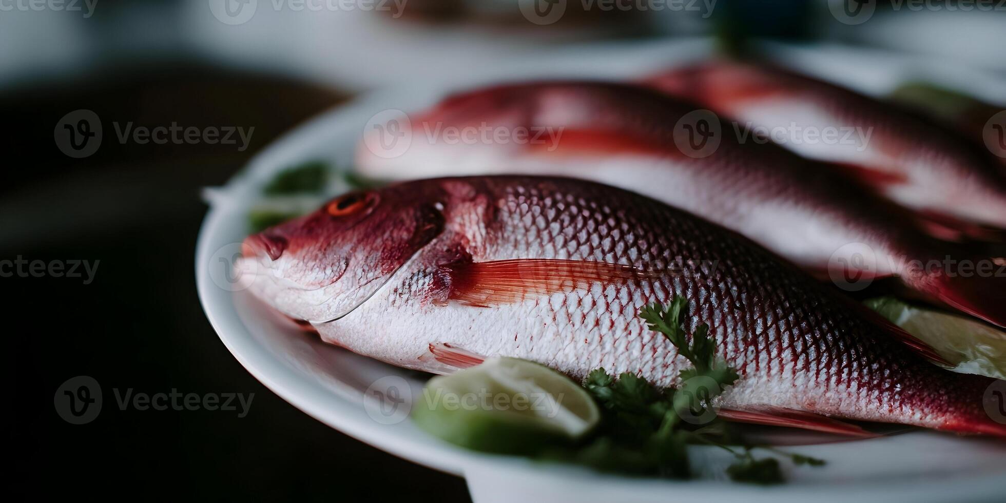 Three Red Snapper Fish on White Plate with Lime and Cilantro photo
