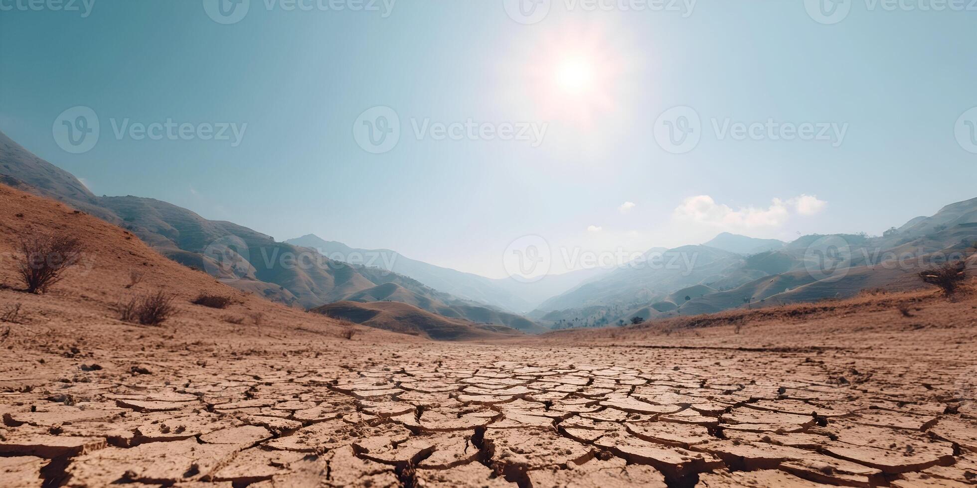 Dry Cracked Earth Desert Landscape Hot Sun Bright Day Mountains Background photo