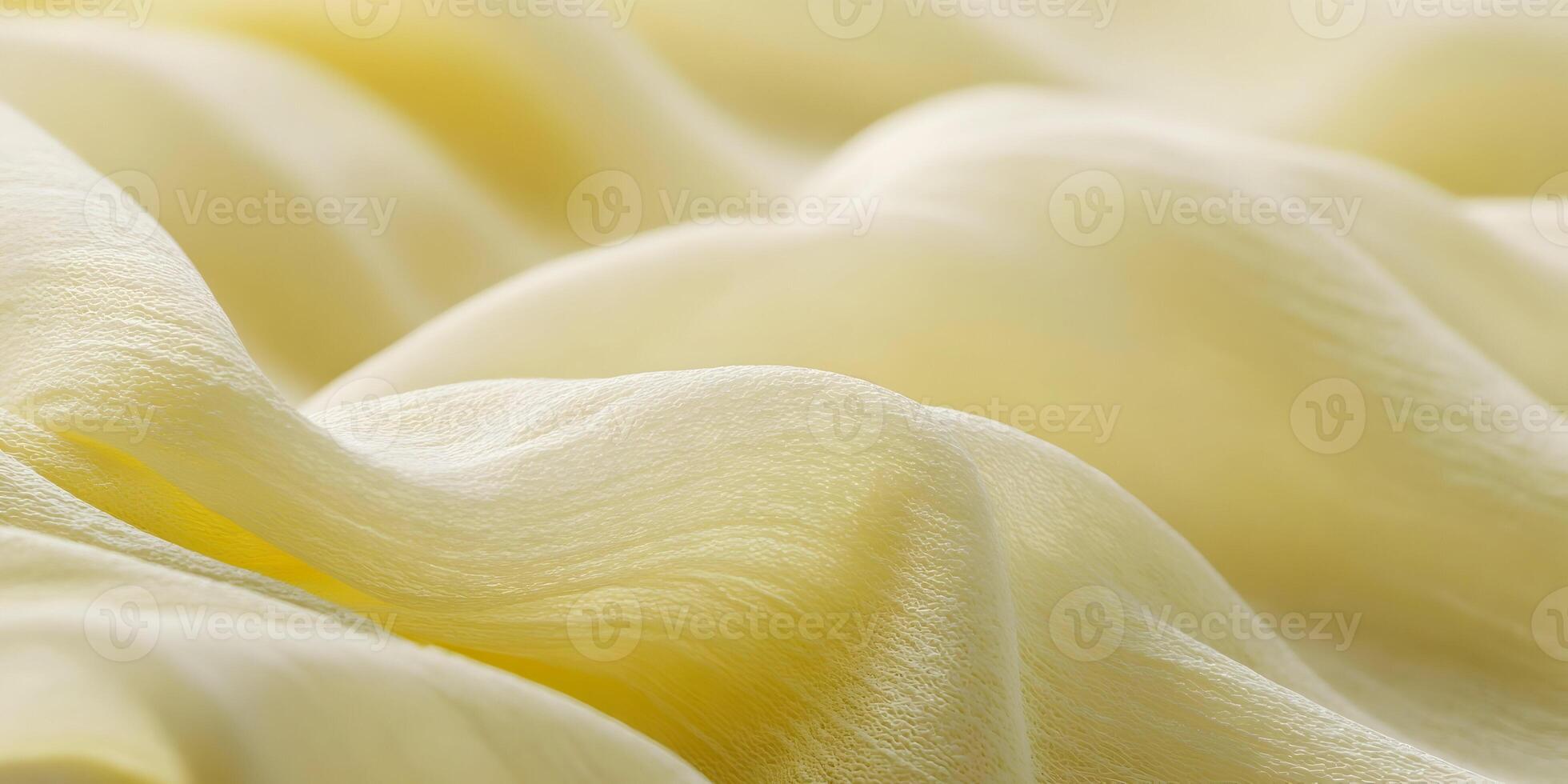 Pale Yellow Fabric Texture Close Up Soft Draped Chiffon Material Background photo