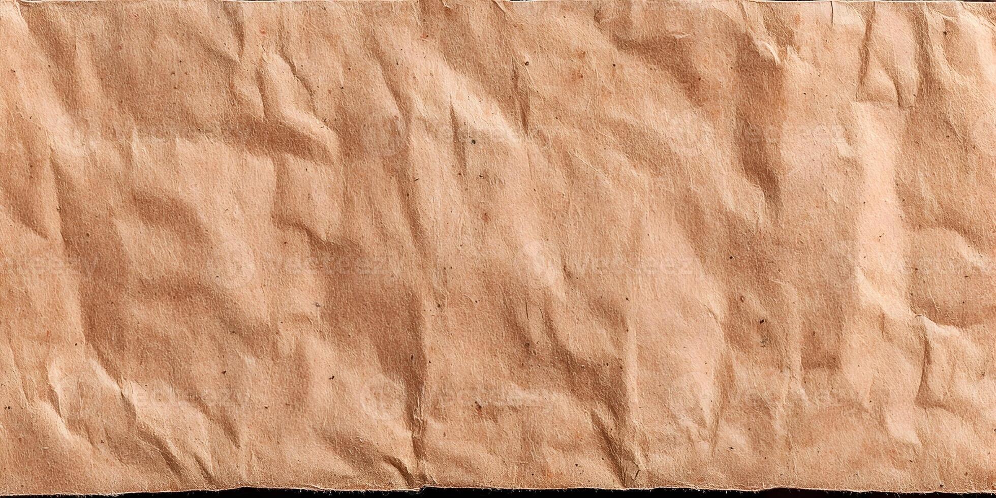 Wrinkled brown paper surface with rustic texture for design use photo
