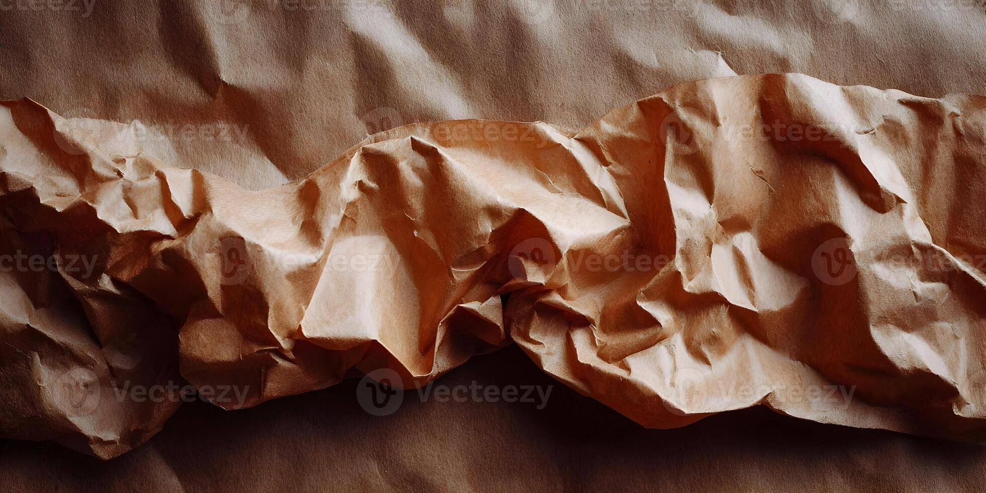 Vintage brown crumpled paper background for visual compositions photo