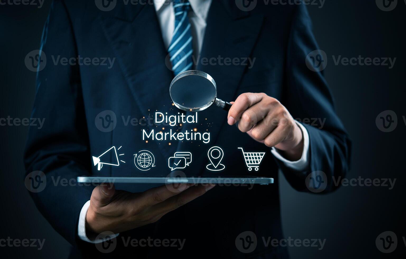 Digital marketing concept - business man holding a tablet with digital marketing icons photo
