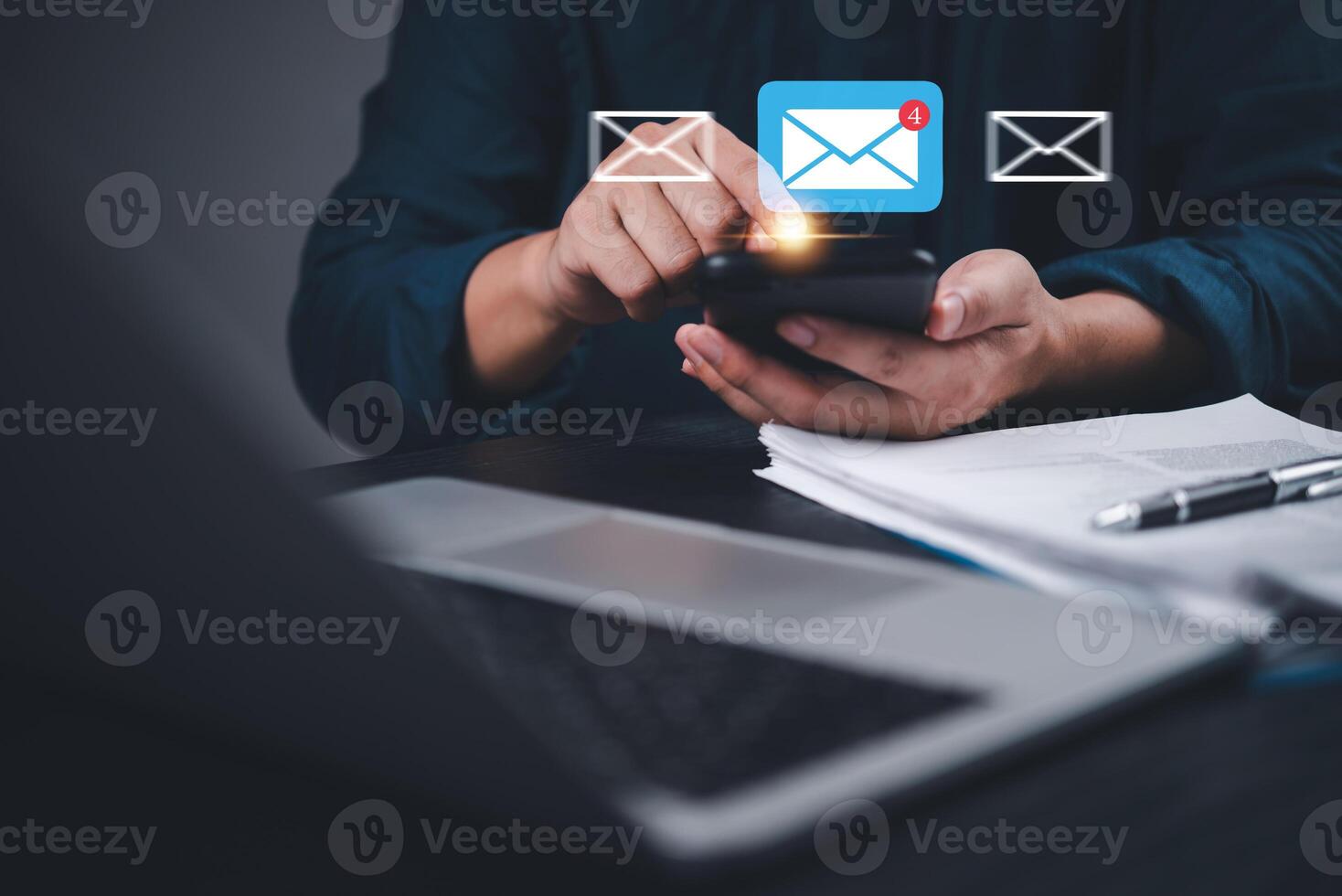 Email marketing concept - business man using smartphone to send email photo