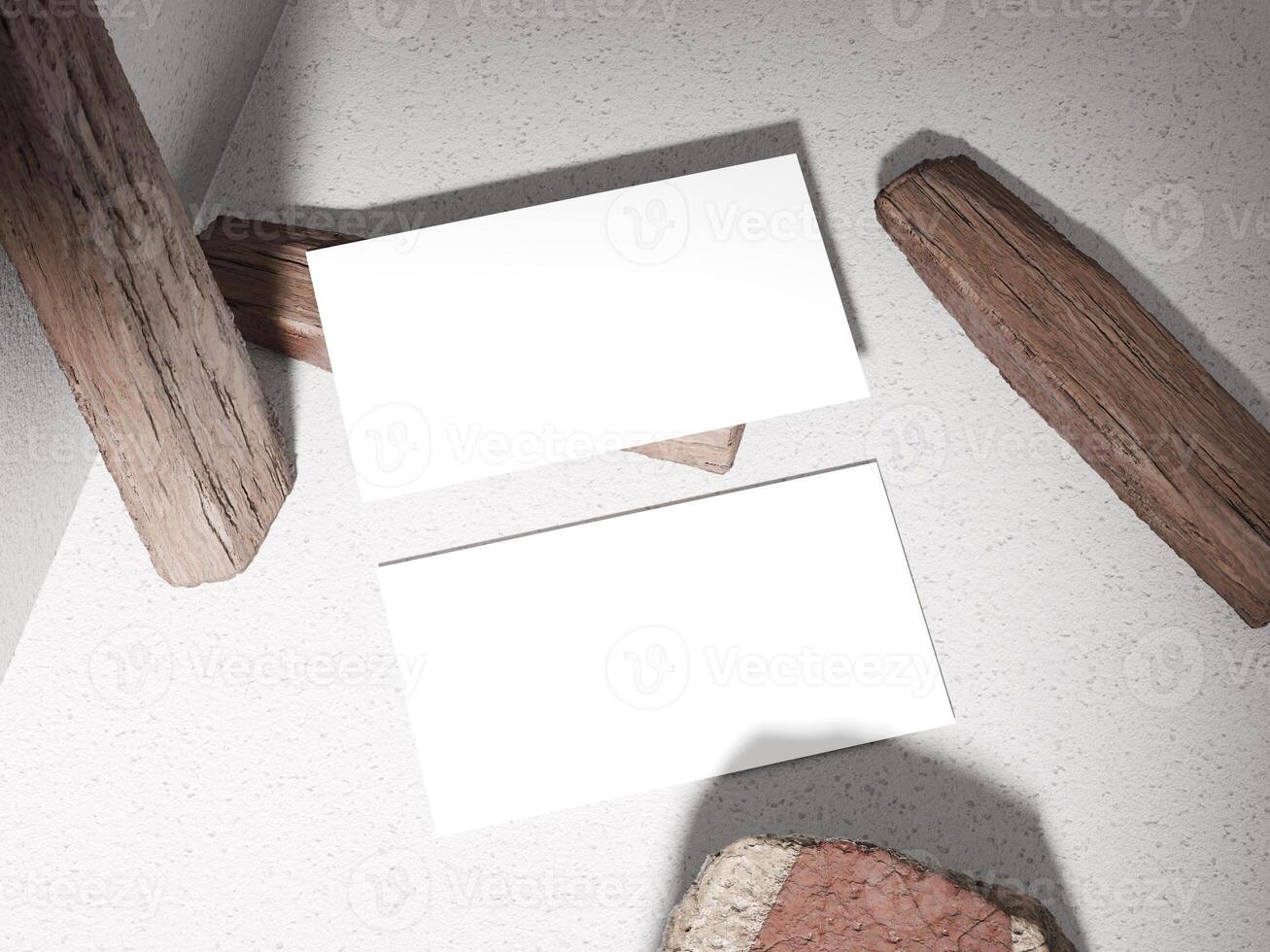 Business card placed on a stone surface with wooden logs, giving an earthy and natural feel. photo
