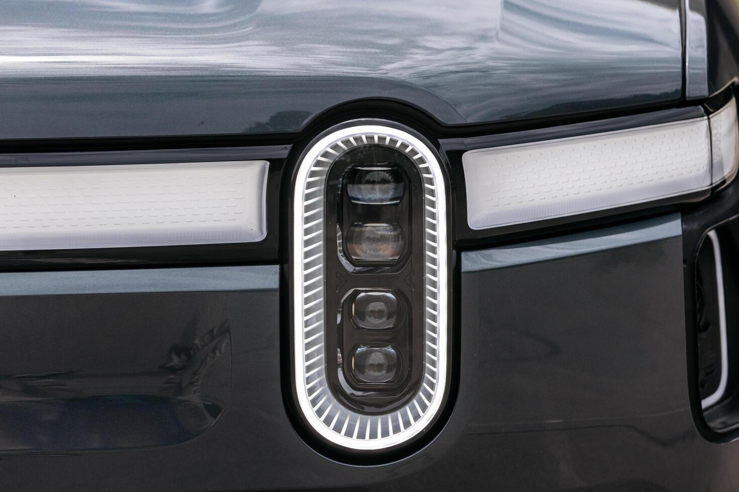 New, modern car close-up. Concept of renting or buying a new car and modern design photo