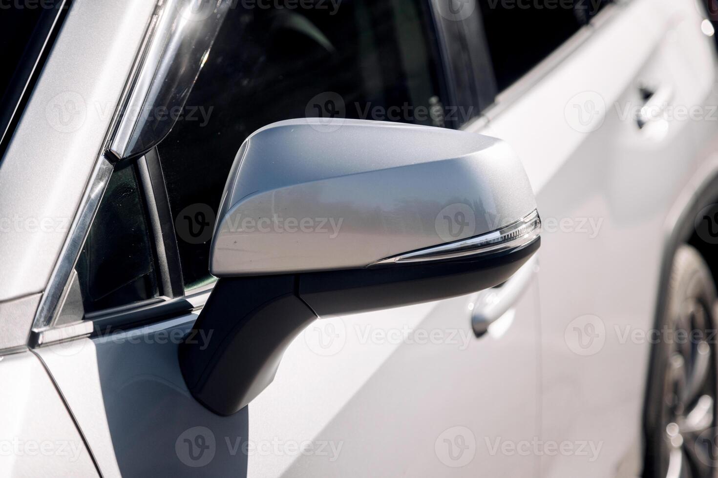 New, stylish car parked in a city parking lot. Concept of leasing and buying a new car. photo
