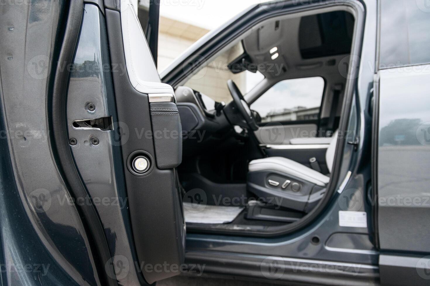New, modern car close-up. Concept of renting or buying a new car and modern design. photo