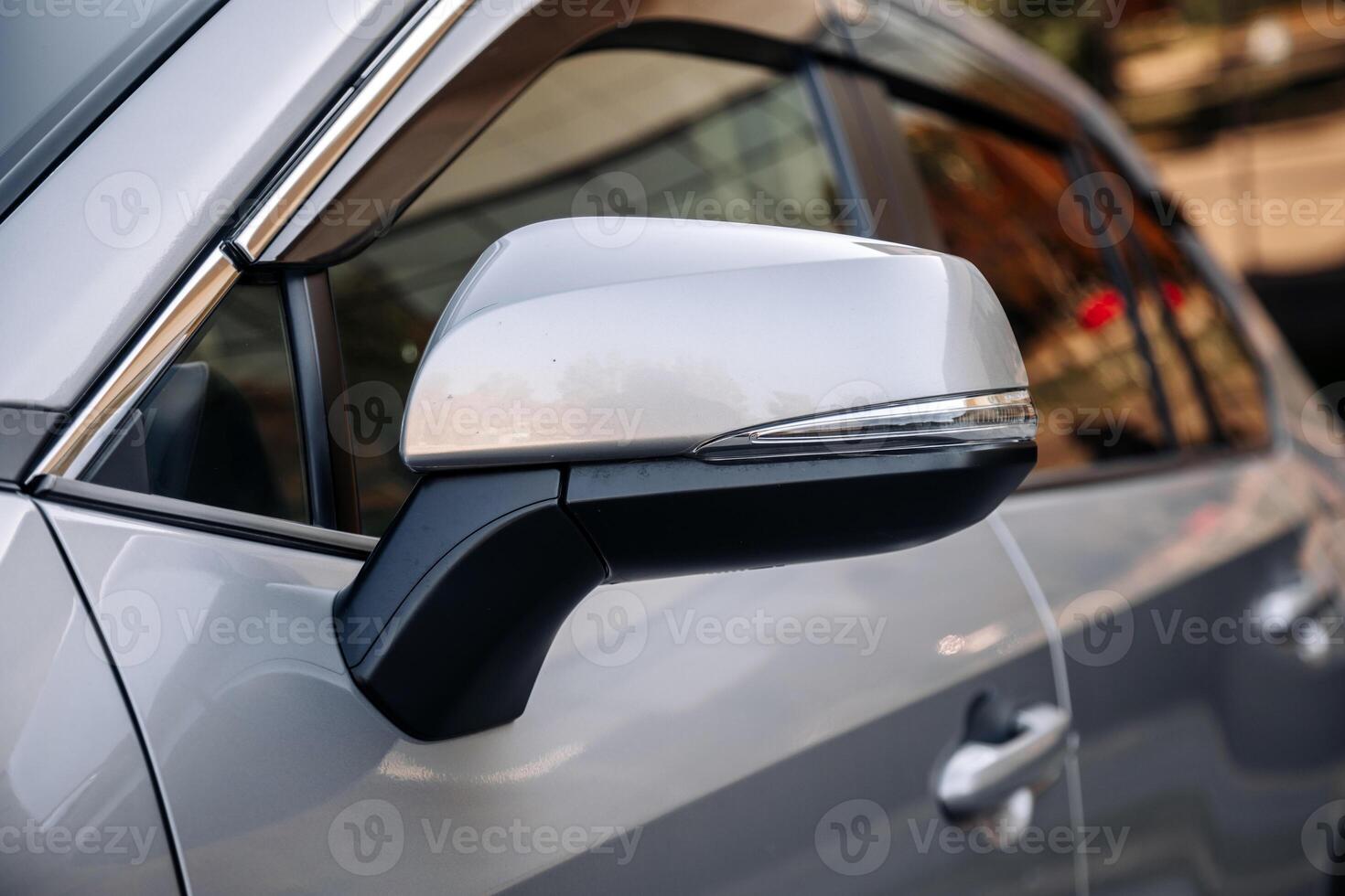 New, stylish car parked in a city parking lot. Concept of leasing and buying a new car photo