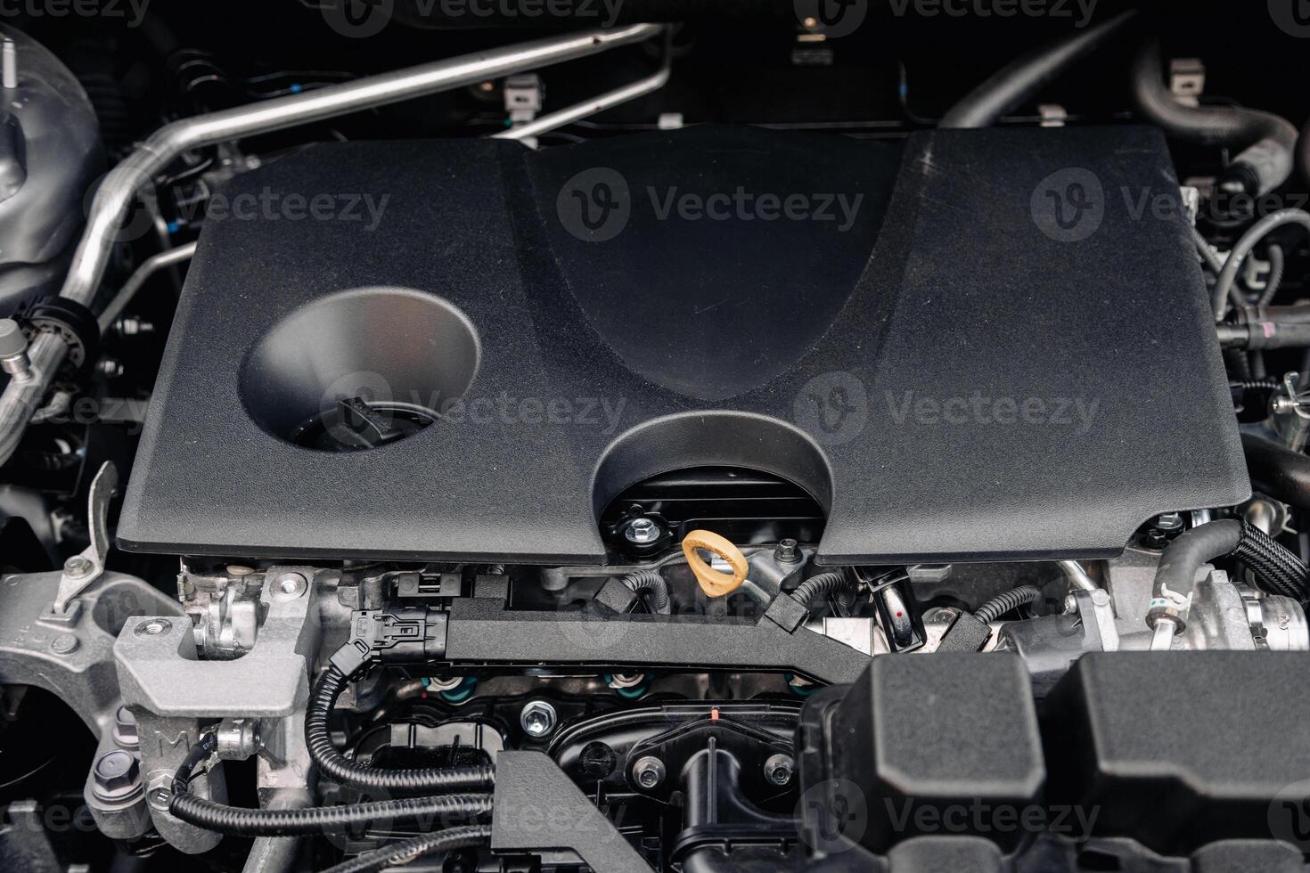 Concept of repair, parts and diagnostics. Close-up of a new car engine. photo