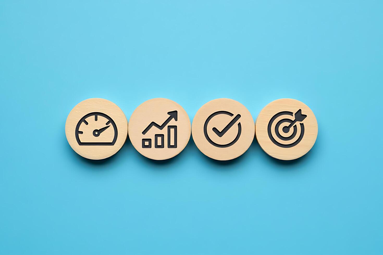 Four wooden buttons with icons on them photo