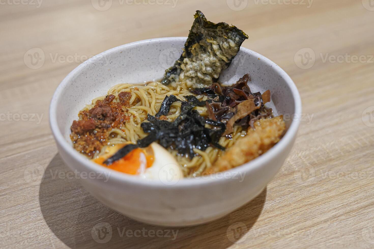 A bowl of food on a table photo