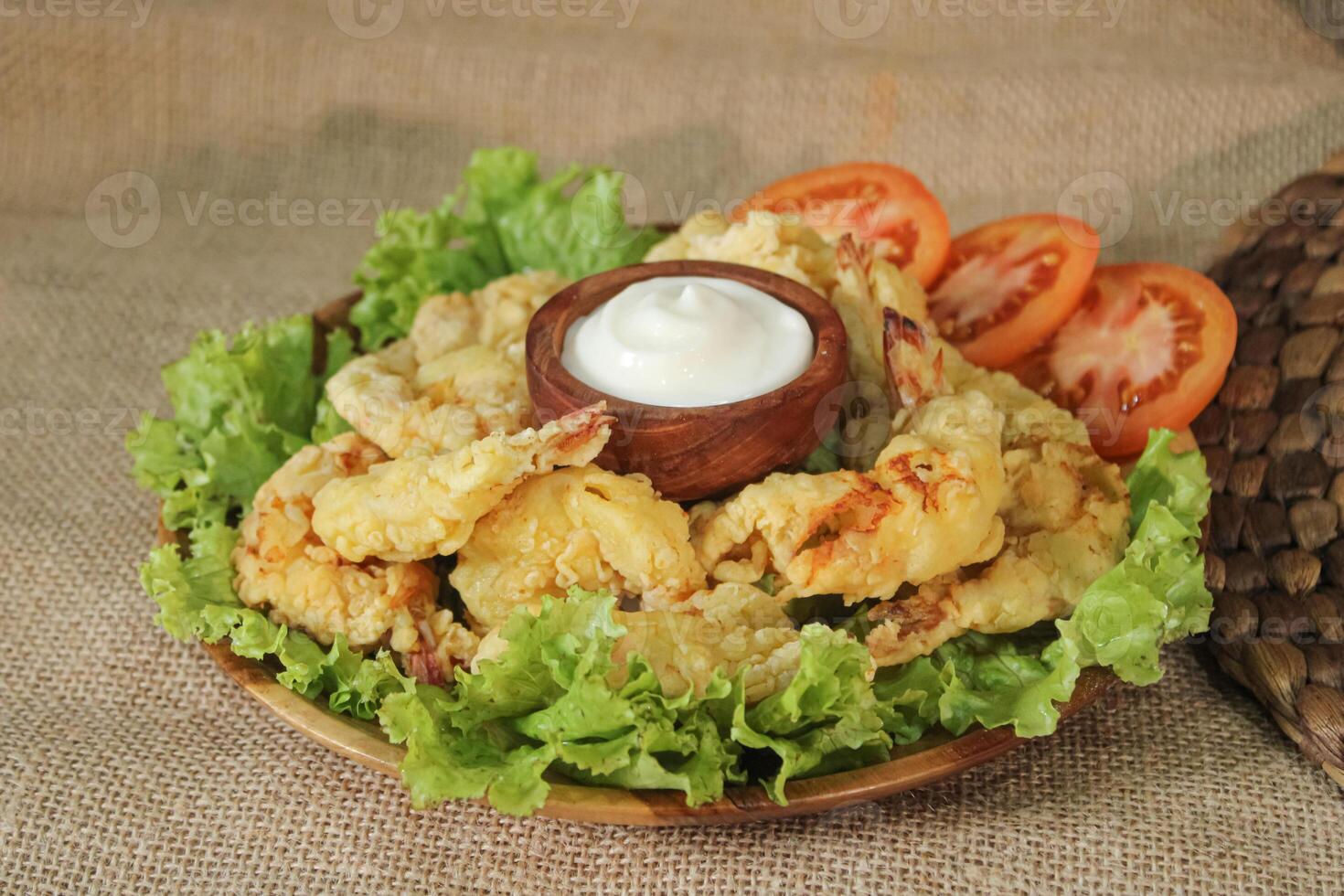 Fried shrimp with mayonnaise on lettuce photo