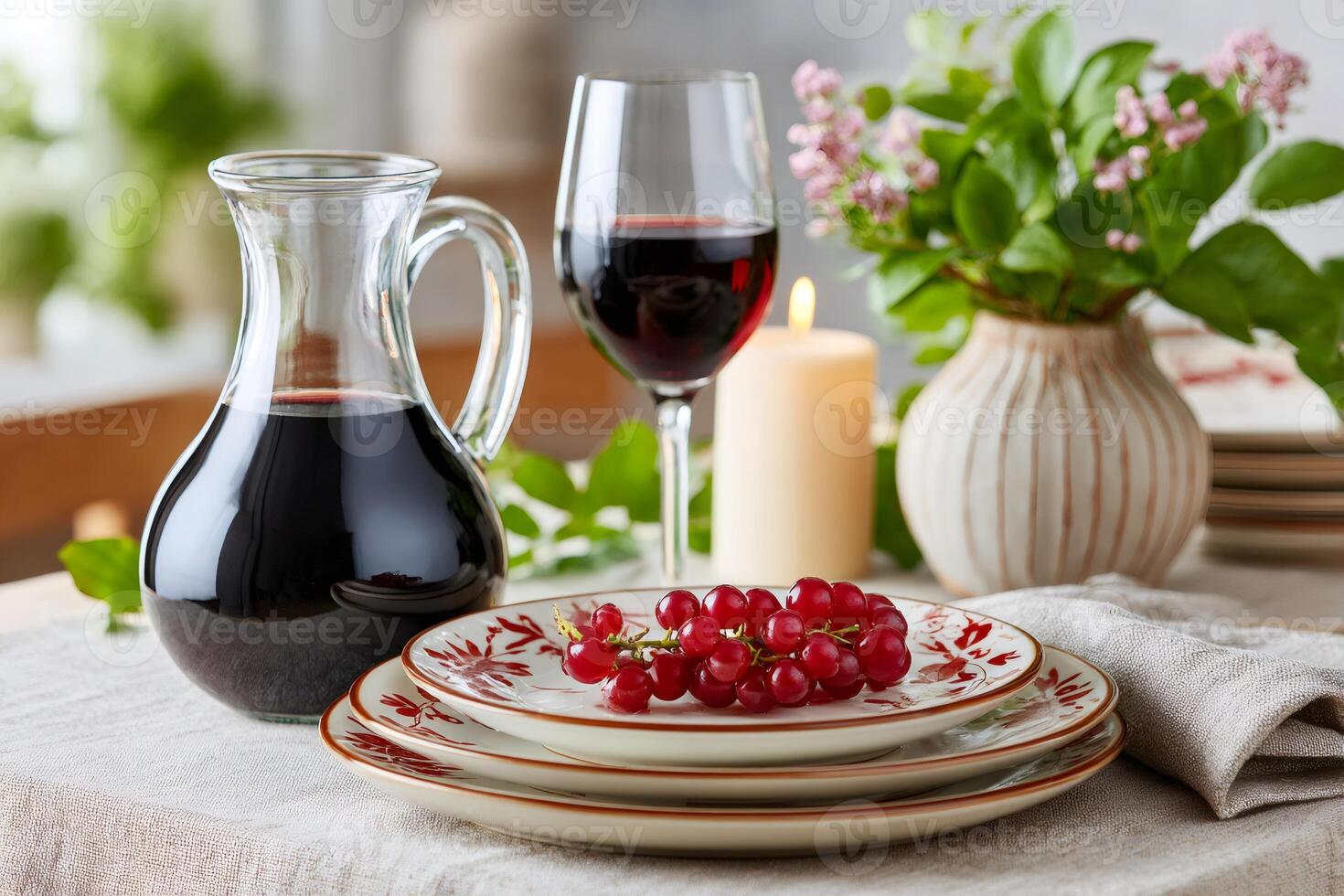 Elegant table setting with red currants, wine and candlelight photo