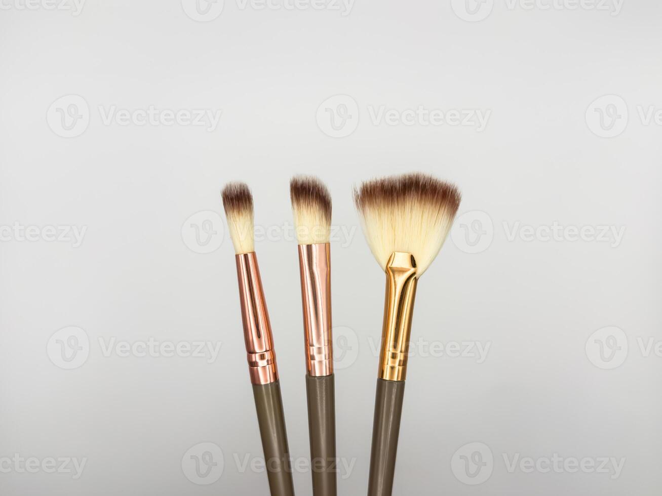 Set of flat top view of various professional female cosmetics brushes for makeup and eyelash brush isolated on white background, Cosmetics concept, Make up concept, Copy space image for your text. photo