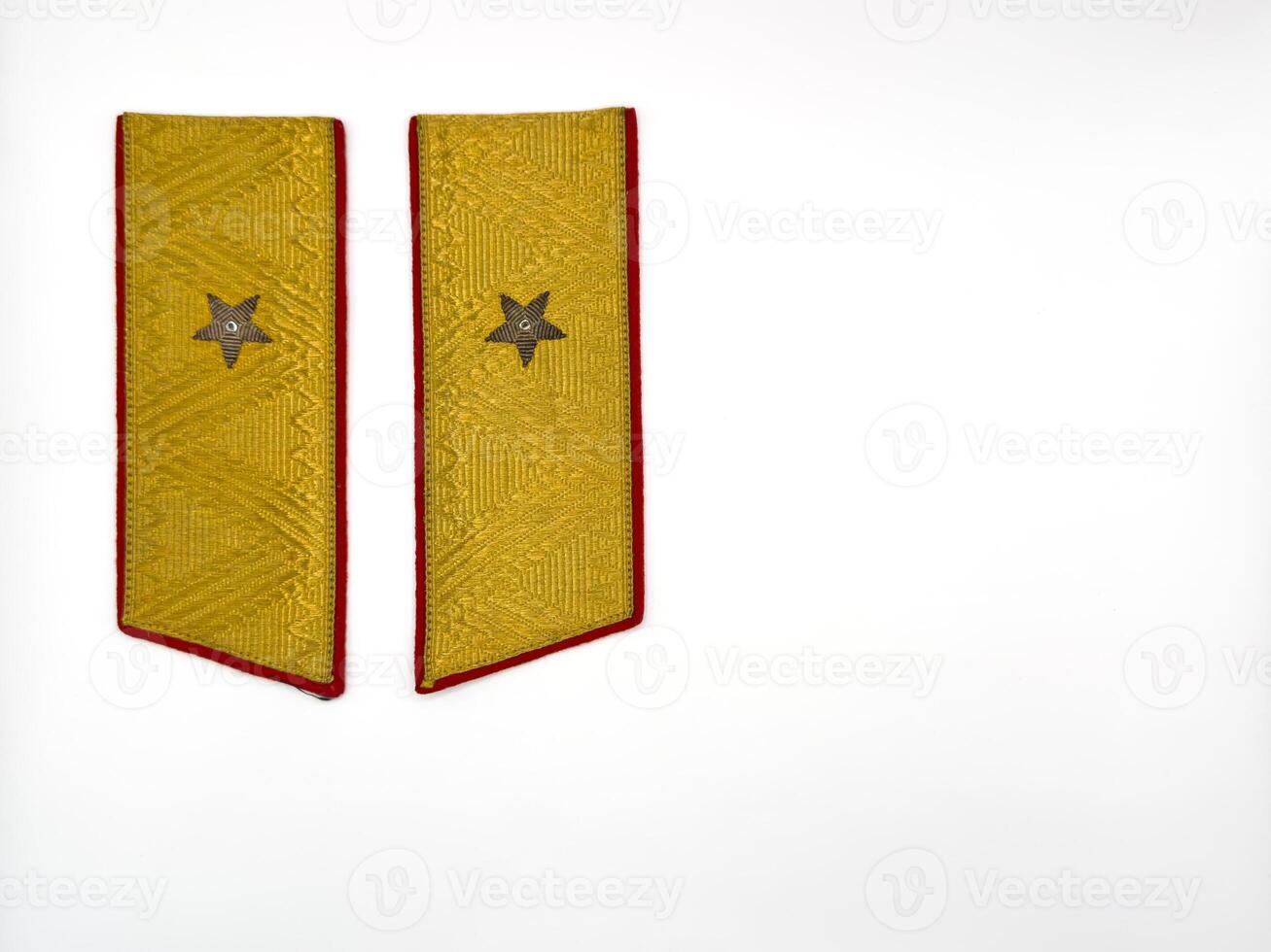 Military shoulder straps of the USSR, shoulder straps on the shoulders of the military, golden shoulder straps on a white background photo