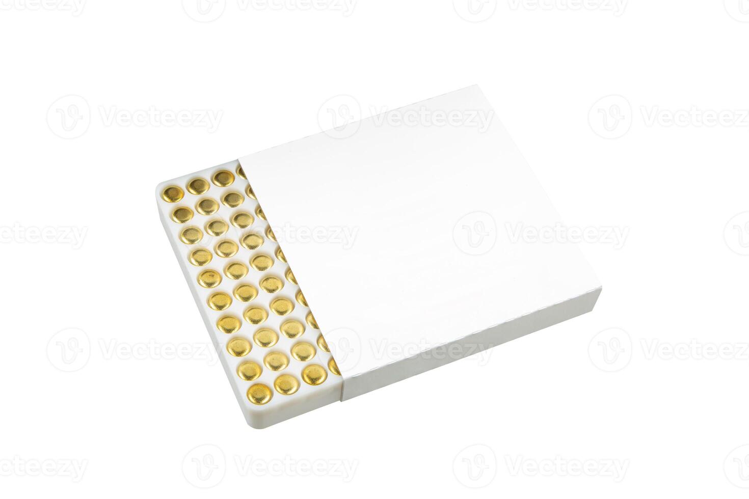 Reloading primers in a white box, isolated on white back photo