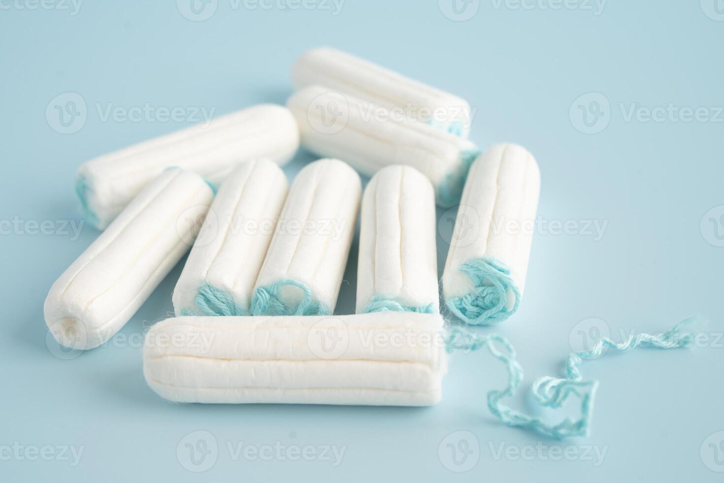 Menstruation cycle sanitary cotton tampon for woman hygiene and protection. photo