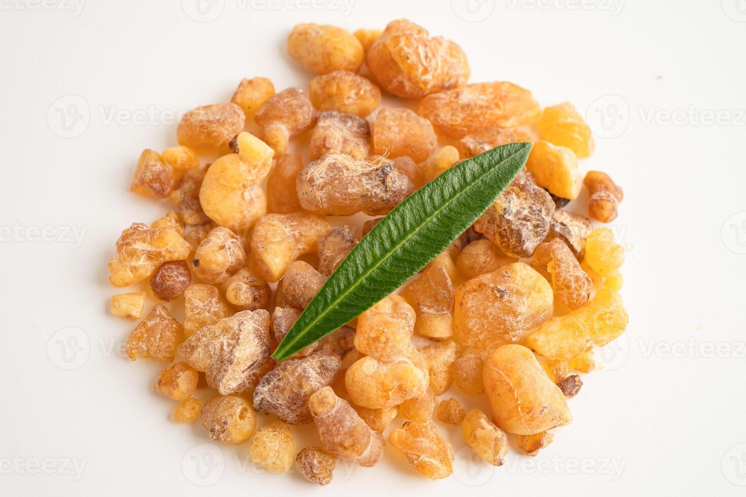 Frankincense olibanum aromatic resin isolated on white background used in incense photo