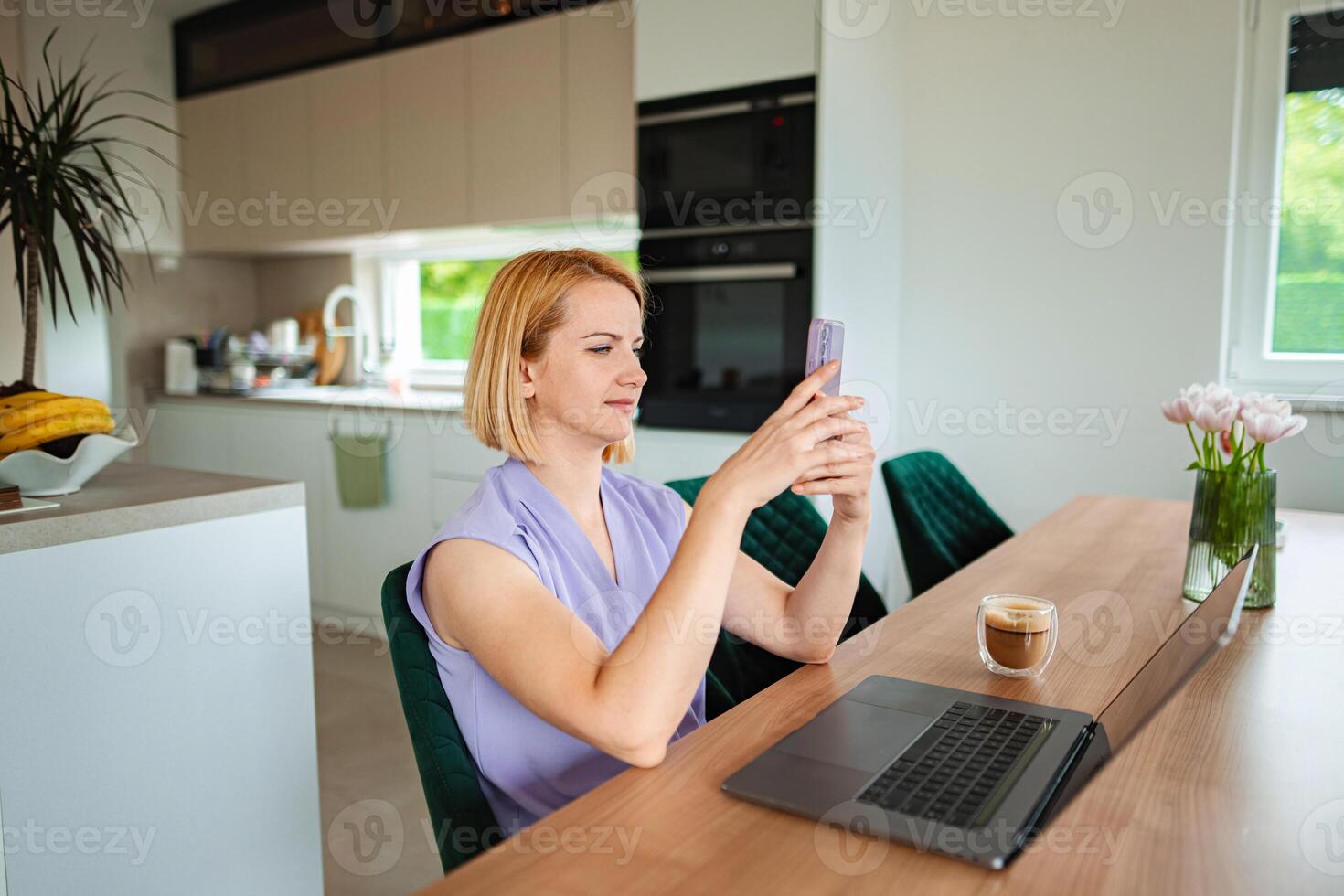 Working at home while enjoying a coffee break moment photo