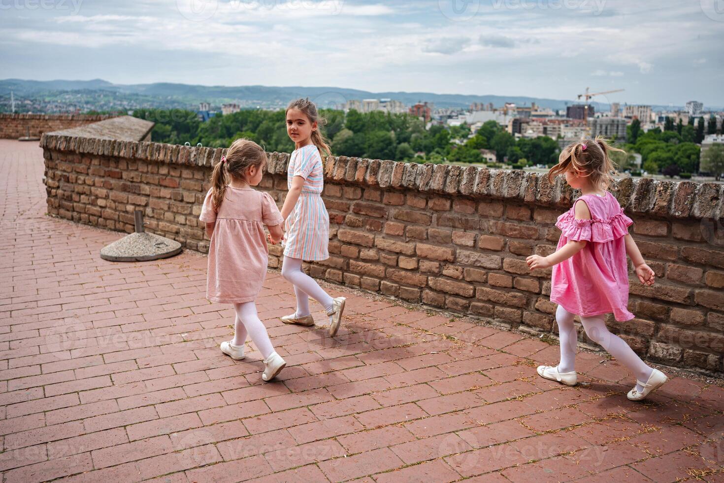 Children exploring Petrovaradin fortress grounds photo