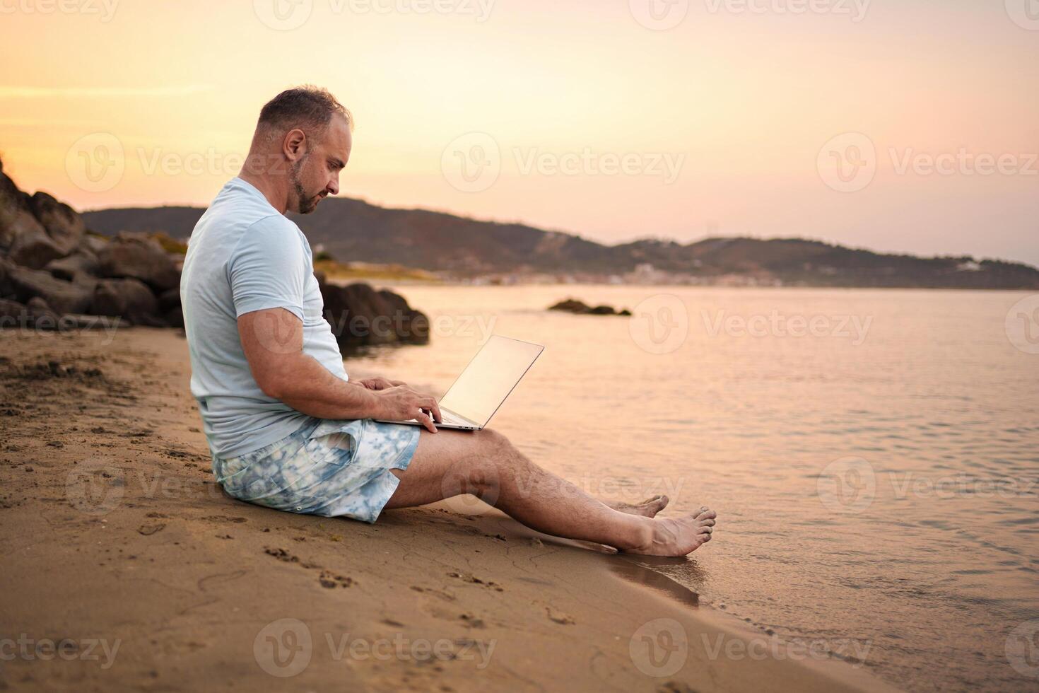 Creating memories while enjoying a beautiful beach sunset with family photo