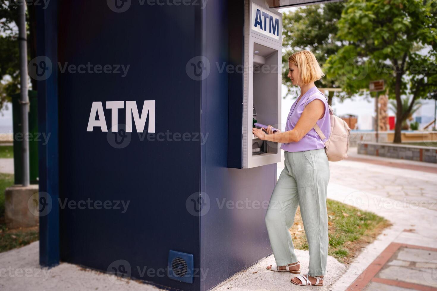 Exploring Greece's summer charm at a local ATM photo