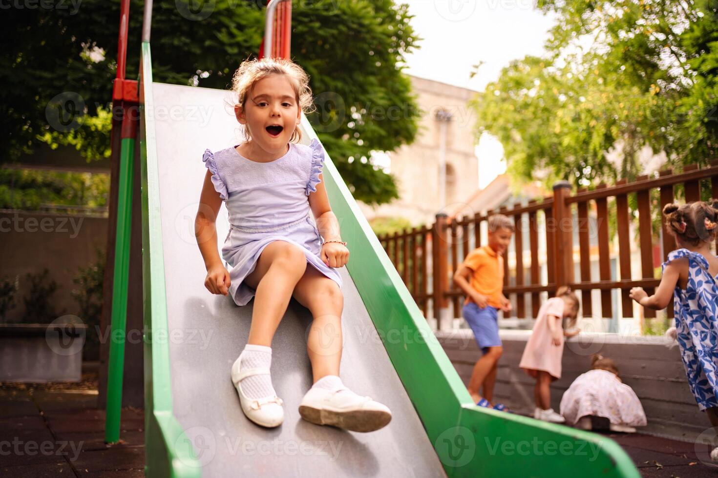 Joyful summer playtime at a Greek playground photo