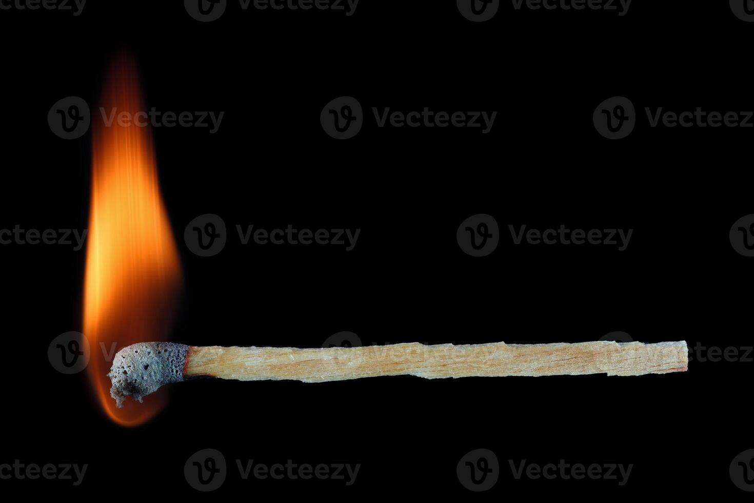 burning dry wood match stick isolated on black photo
