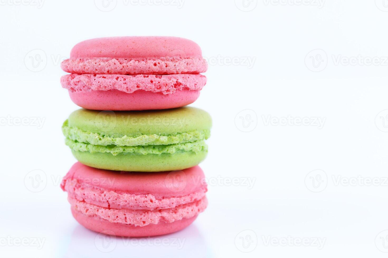 Three macaroons isolated on white photo