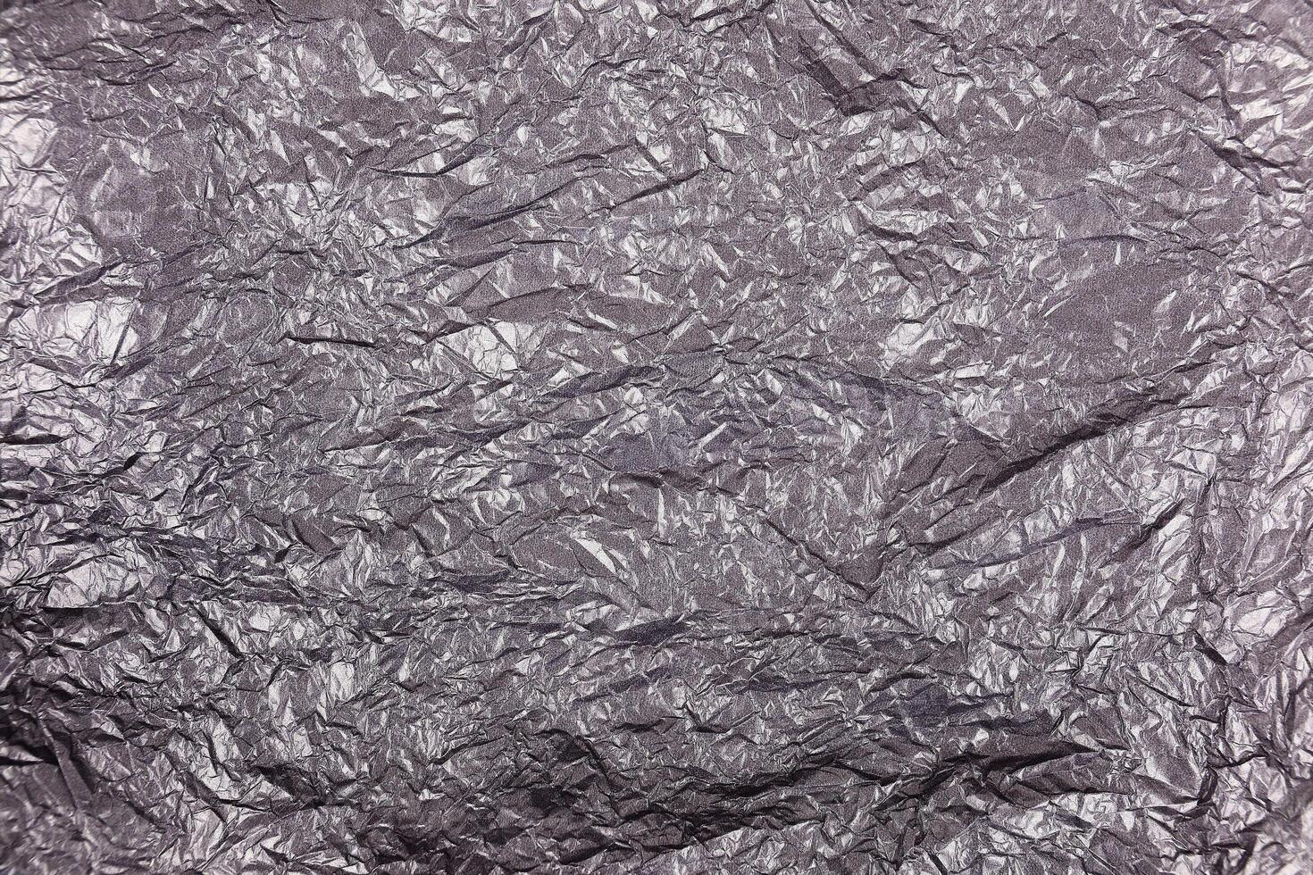 black crumpled paper background photo