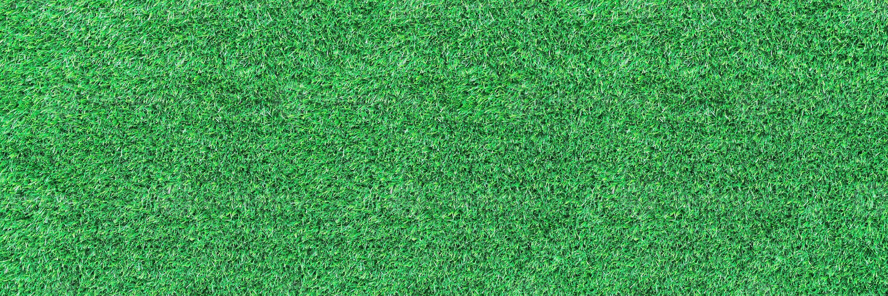 horizontal artificial green grass for pattern and background photo