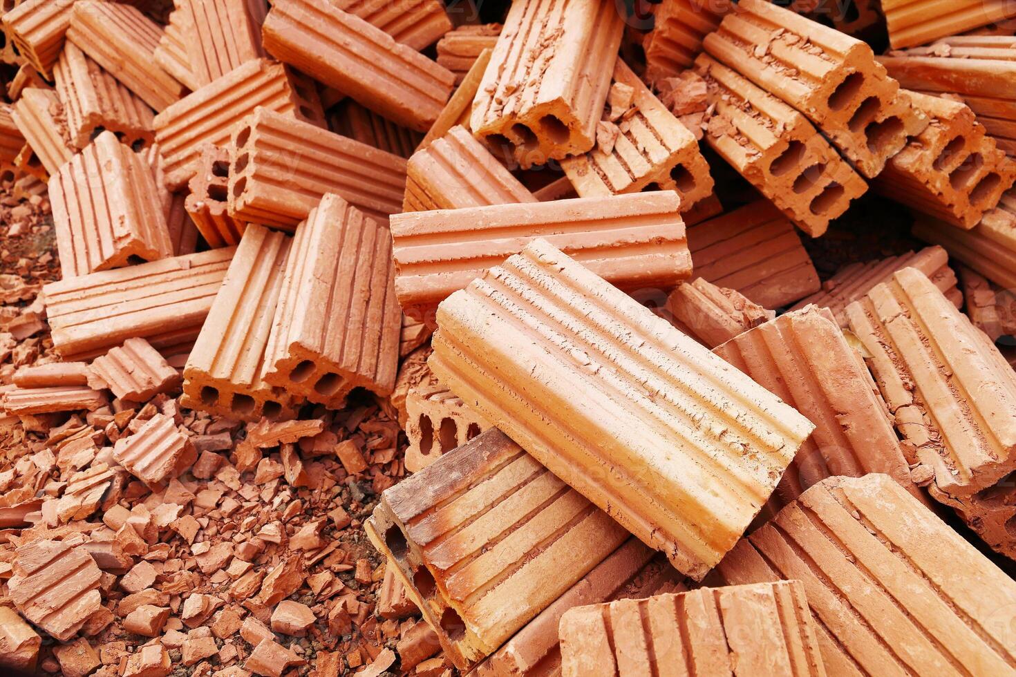 pile of construction bricks for pattern and background photo