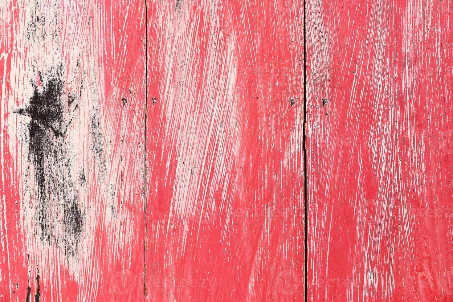 red painted on old wood for background and design photo