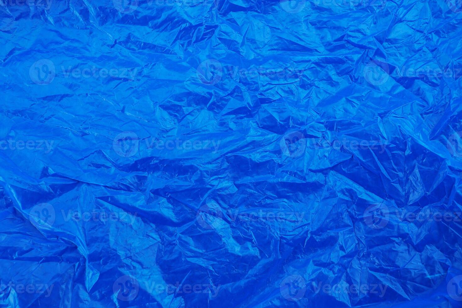 blue wrinkled plastic texture background photo