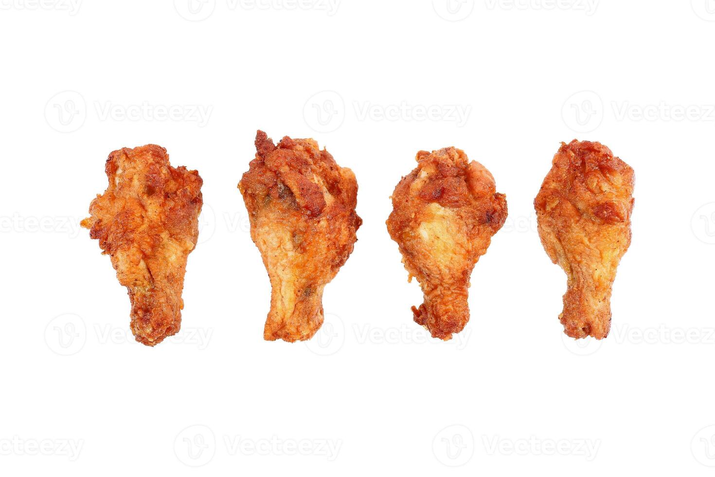 deep fried chicken thighs isolated on white photo