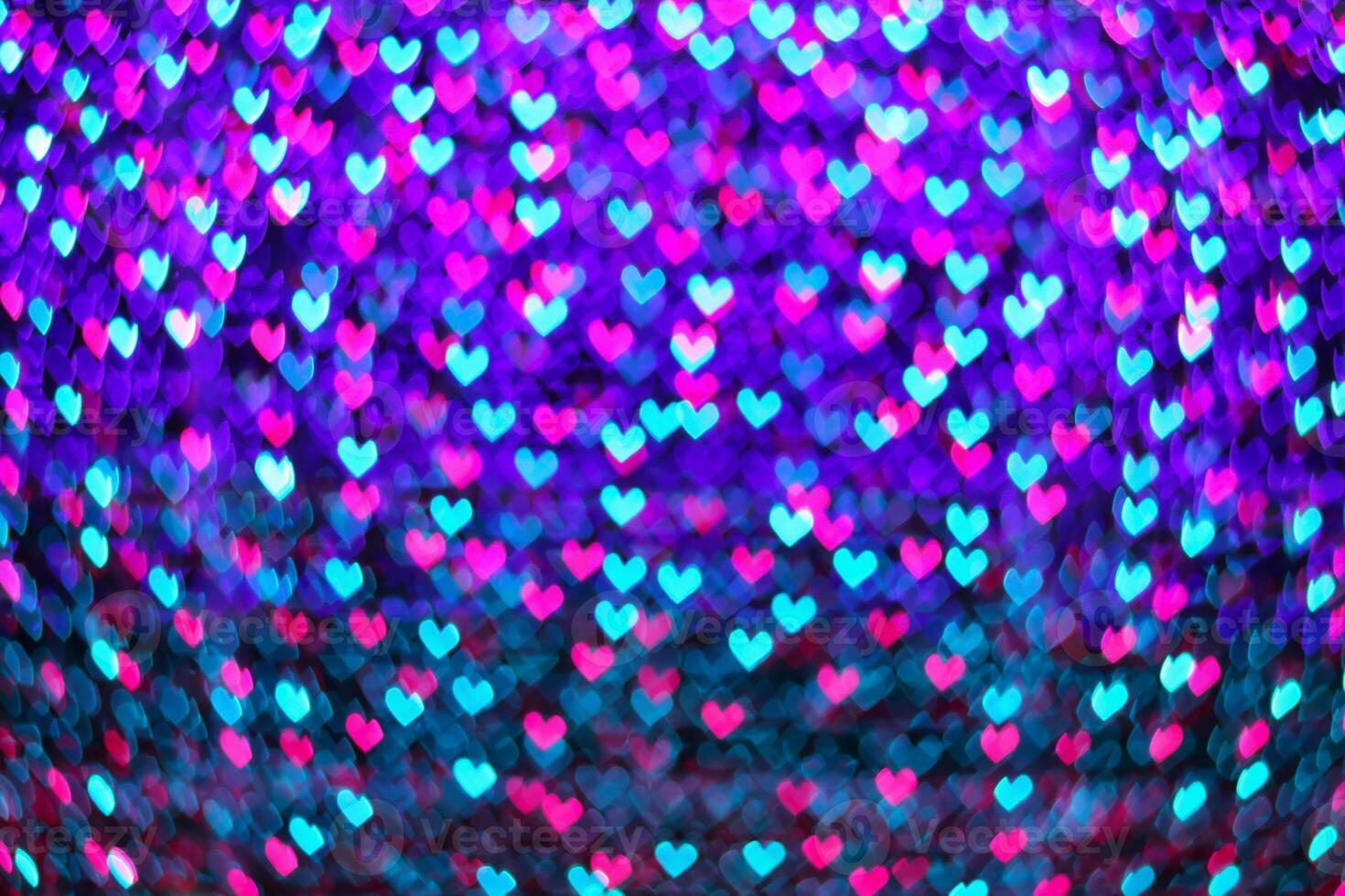 multicolored neon blur heart shape light from camera lens for pattern and background. photo