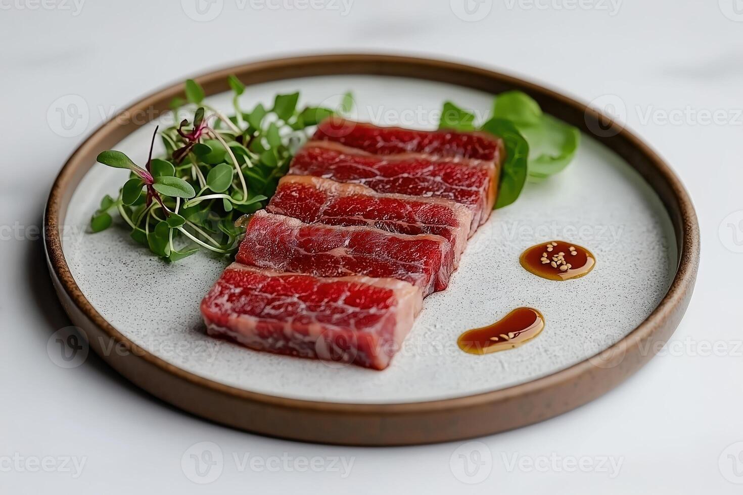 Exquisite michelin star beef appetizer with microgreens and soy sauce photo