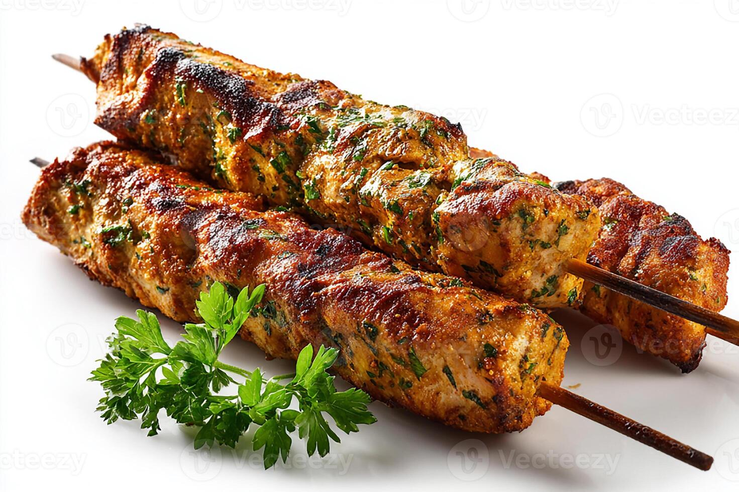 Grilled chicken kababs garnished with vibrant flat parsley leaves photo