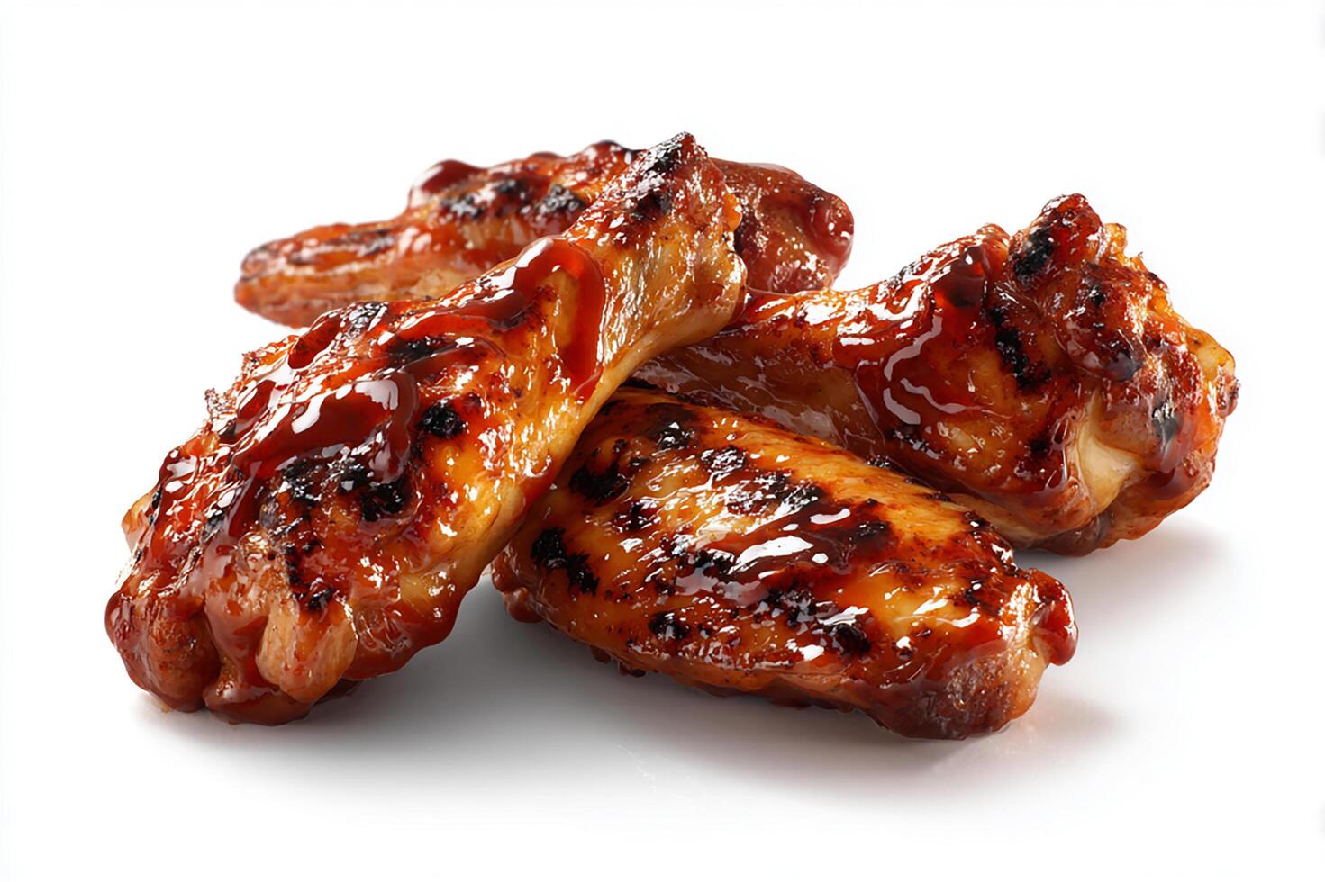 Delicious grilled chicken wings covered in flavorful BBQ glaze for dinner meal photo