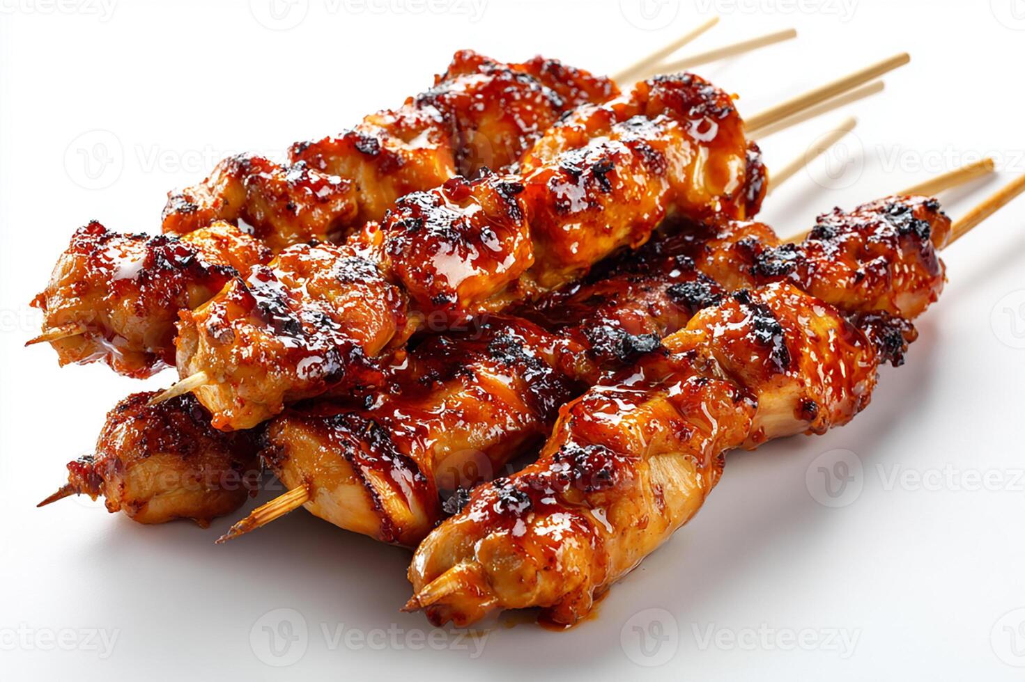 Tasty BBQ chicken skewers with glaze on white table photo