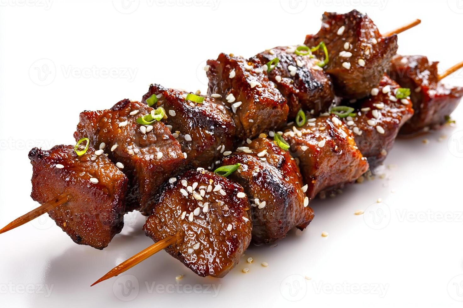 Juicy grilled Moroccan beef kebabs with traditional seasoning on white background photo