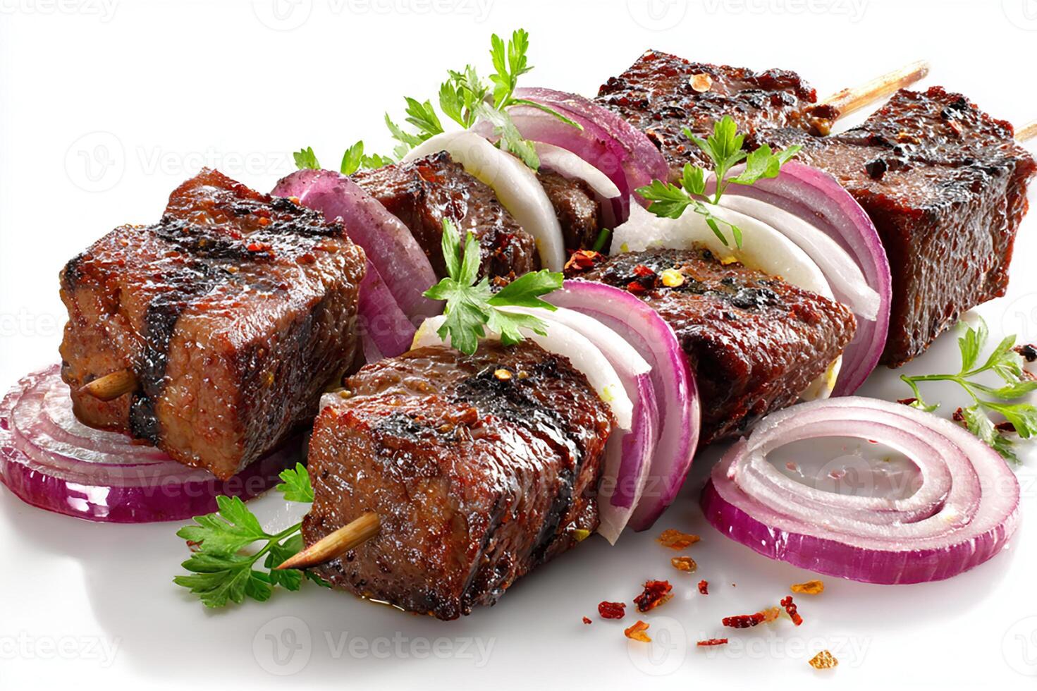 Realistic grilled beef kababs with sliced onion and garlic on white background photo