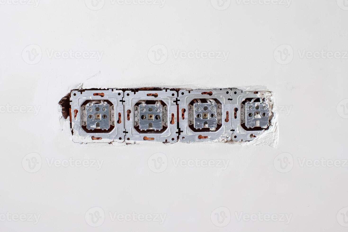 A Place Has Been Prepared for the Installation of an Electrical Outlet. Location of Electrical Socket Repair Process. Repair in the Apartment, Office photo